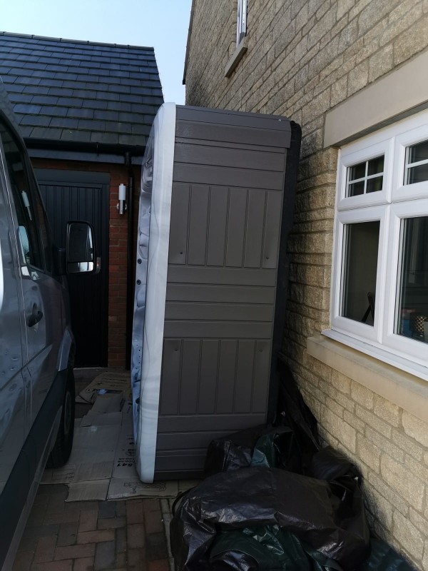 Hot Tub Move – Crane Lifting a hot tub into a garden