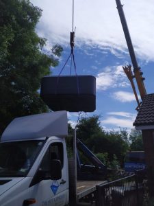 Hot Tub Move - Another Day Of Cranes 6 Hot tub being lifted off a truck - The Hot Tub Mover