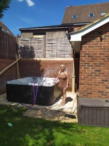Debra with her hot tub - The Hot Tub Mover