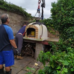 Hot Tub Move - We Move A Pizza Oven 6 Pizza Oven nearly in place - The Hot Tub Mover